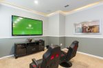 The games room has a 80-inch TV for you to enjoy as well